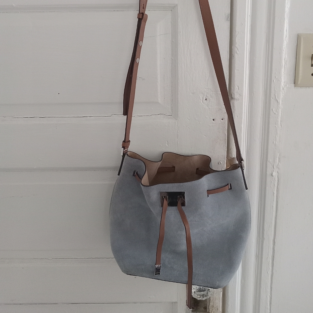 Michaela Kors baby blue Suede cross body purse